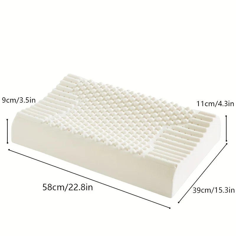Measurement chart of a white pillow with dimensions labeled