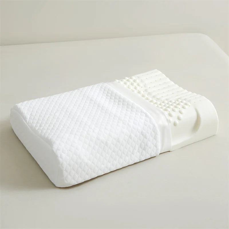 White contour pillow on a light gray surface