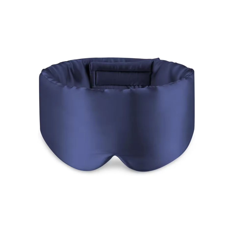 Navy blue sleep mask on a white background